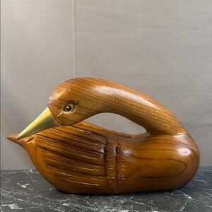 Handcrafted vintage Wooden goose decoy with brass beak